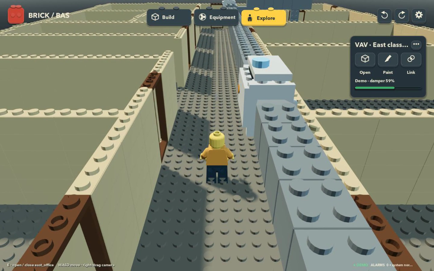 A minifigure exploring the brick-bas school corridor beneath its ductwork